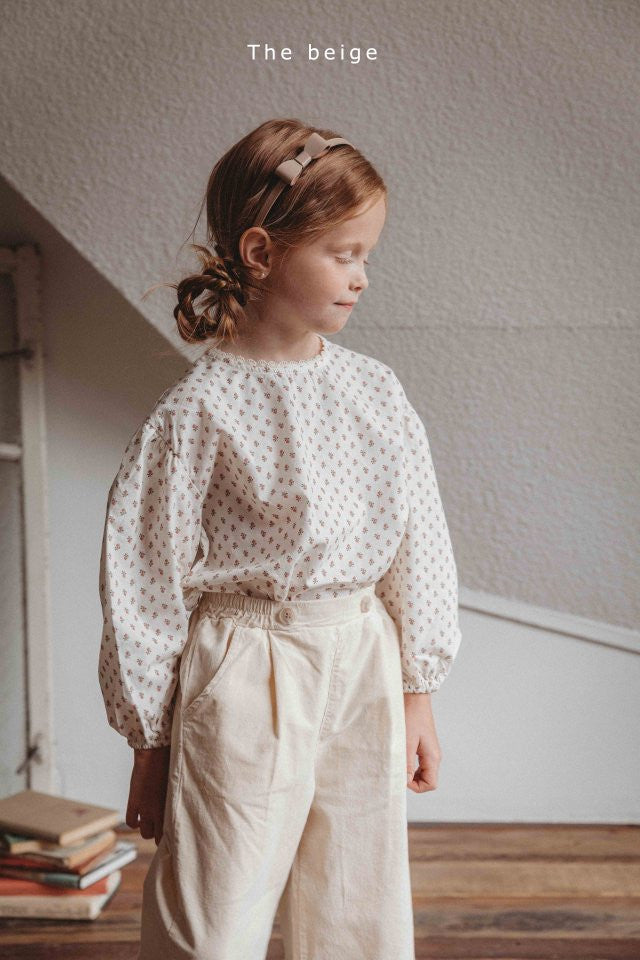 V2. Blusa flores