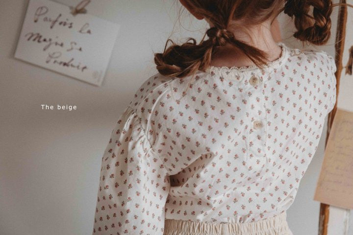 V2. Blusa flores