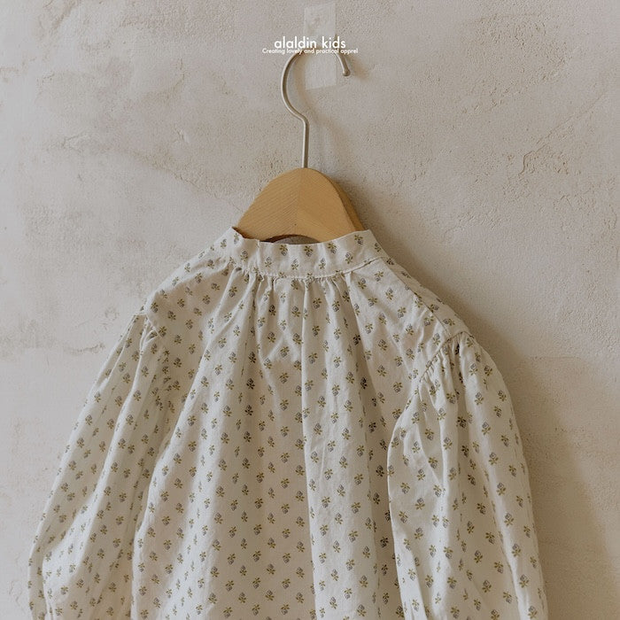 A2. Blusa flores con lazada