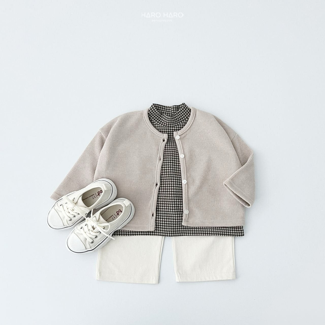 W2. Chaqueta rib en crudo y beige
