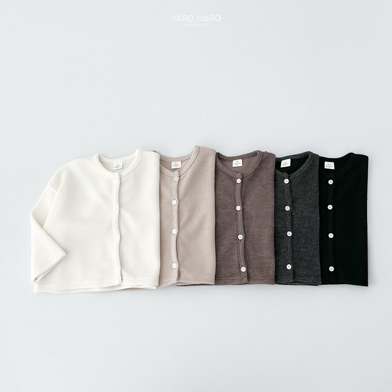 W2. Chaqueta rib en crudo y beige