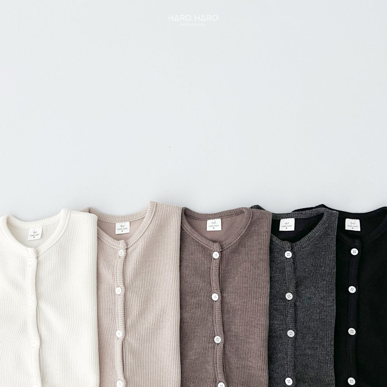 W2. Chaqueta rib en crudo y beige