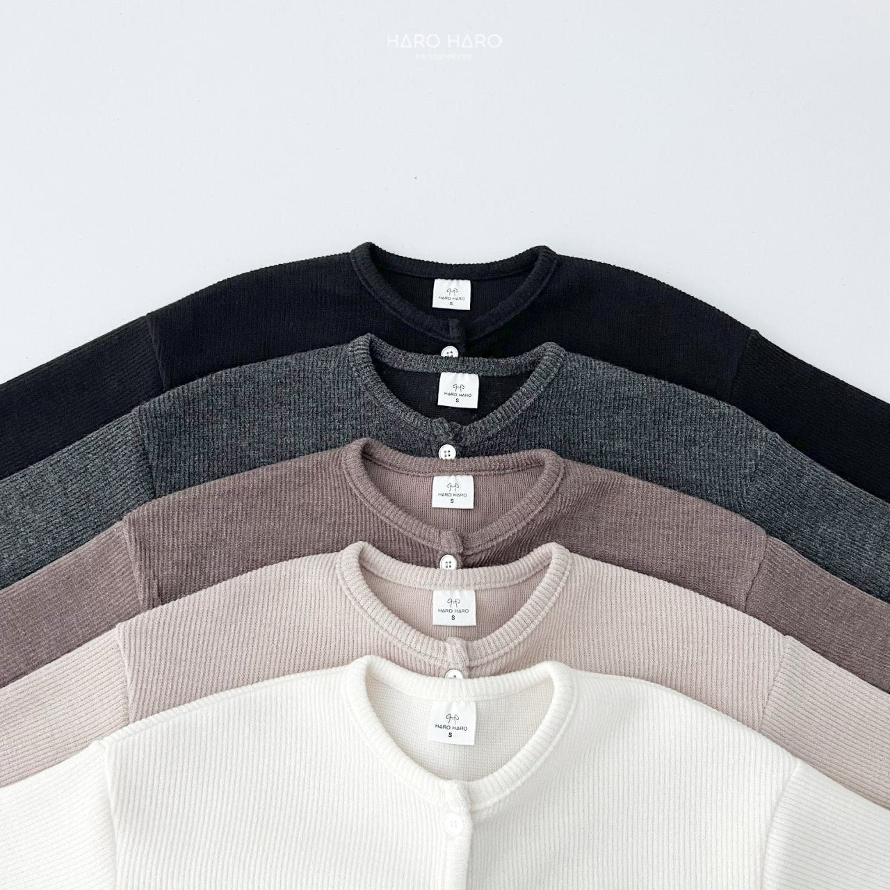 W2. Chaqueta rib en crudo y beige