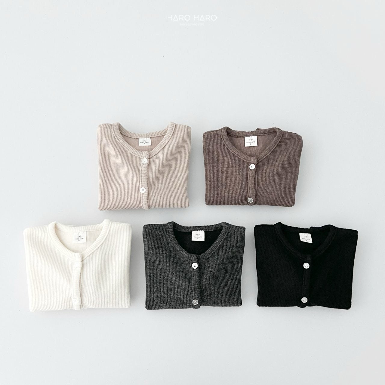 W2. Chaqueta rib en crudo y beige