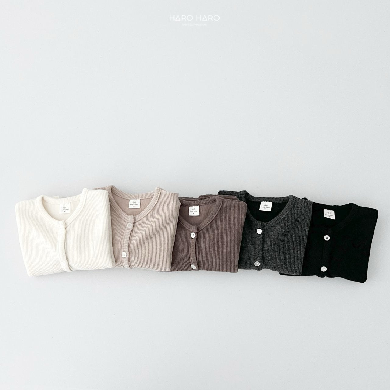 W2. Chaqueta rib en crudo y beige