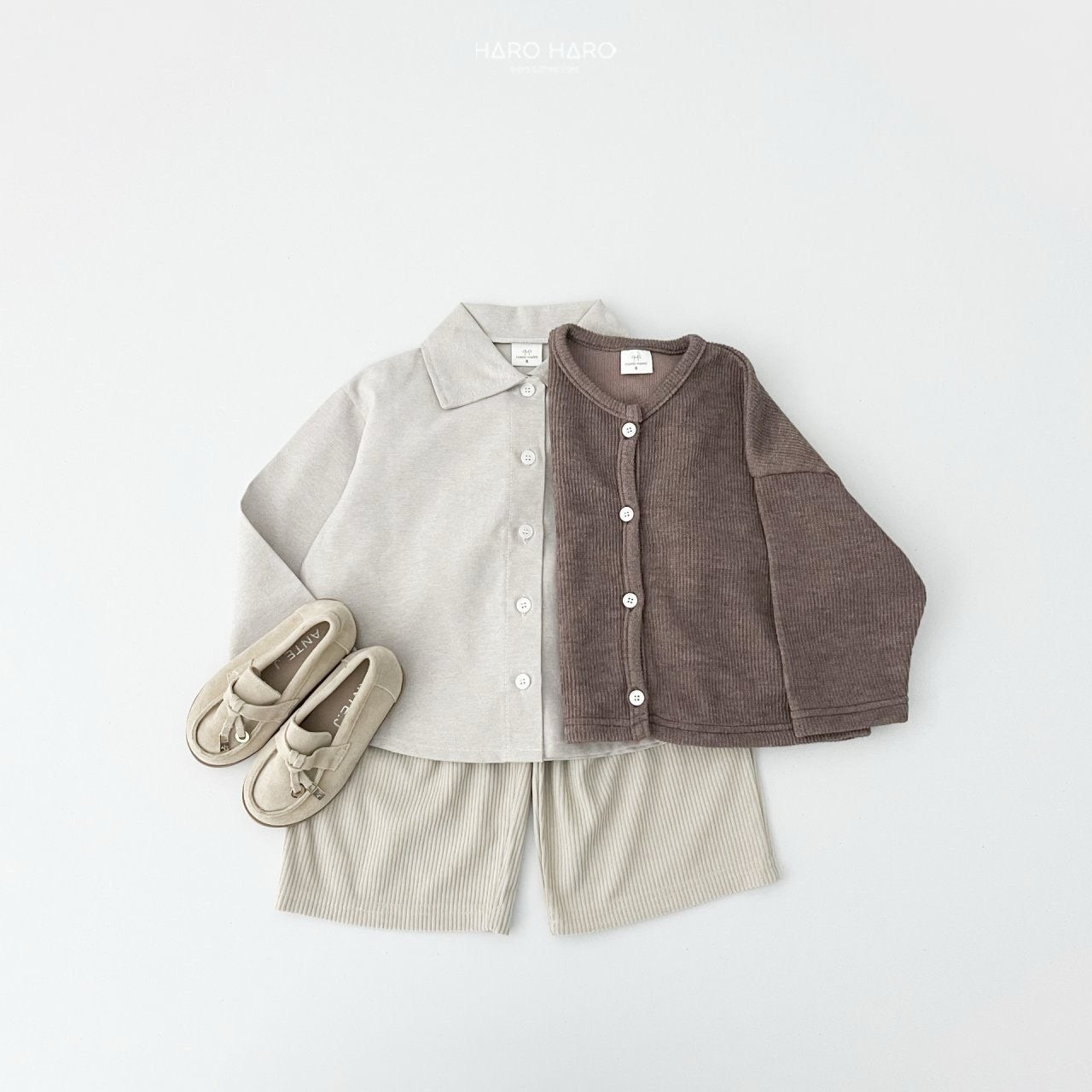 W2. Chaqueta rib en crudo y beige