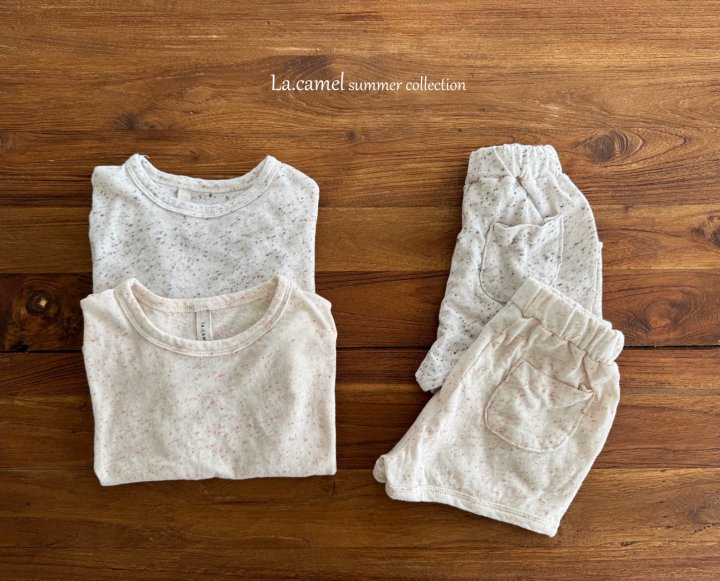 V1. Conjunto camiseta y pantalón corto en crudo